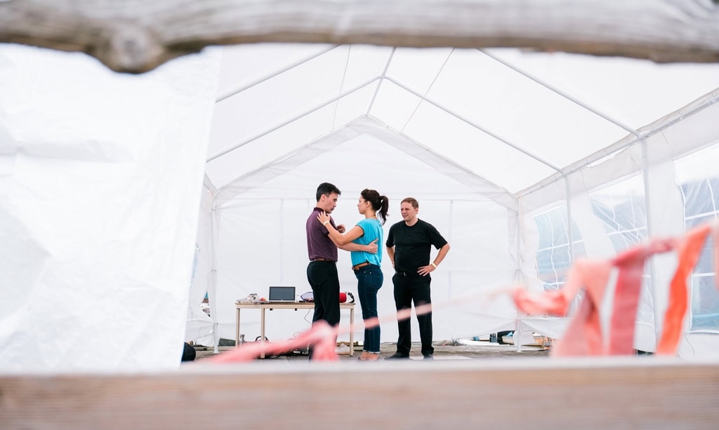 Dance instructor teaching a partner dance technique at Ceuvel Swing Camp - Kibble teaching a private lesson to a dance couple